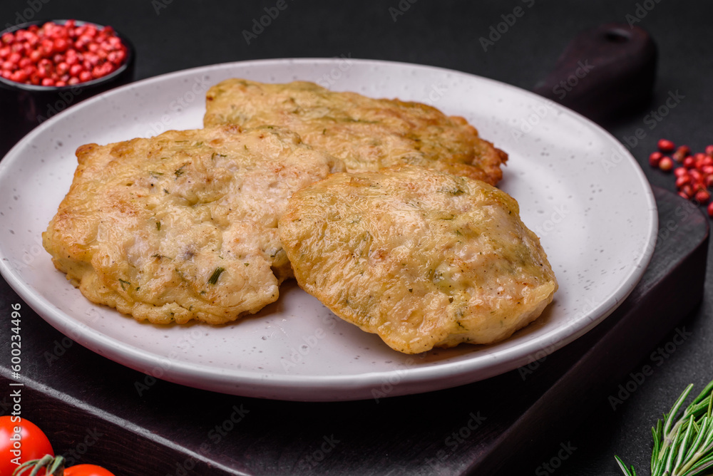 Delicious fried chopped fillet pancakes with spices, salt and herbs Delicious fried chopped fillet pancakes with spices, salt and herbs