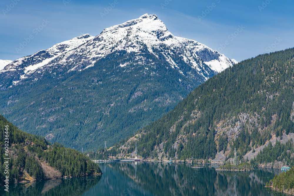 Landscape of Snowcapped Davis Peak with Diablo Lake and Diablo Dam in the Foreground in the North Cascades Mountains and Forest in Whatcom County, Washington, USA