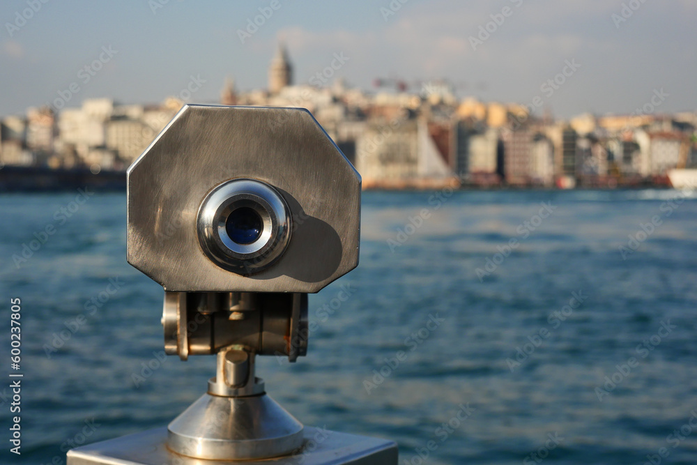 Coin-operated binoculars looking out over city , Coin-operated binoculars looking out over city ,