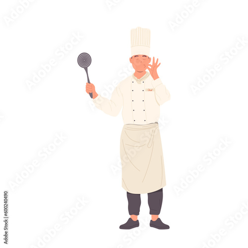 Restaurant chef in uniform standing with kitchen skimmer gesturing delicious sign isolated on white