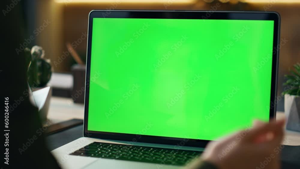 Unknown person talking online conference looking laptop green screen close up. Unknown person talking online conference looking laptop green screen close up.