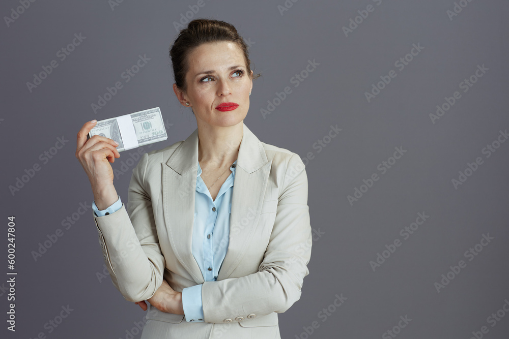 pensive elegant business owner woman in light business suit pensive elegant business owner woman in light business suit