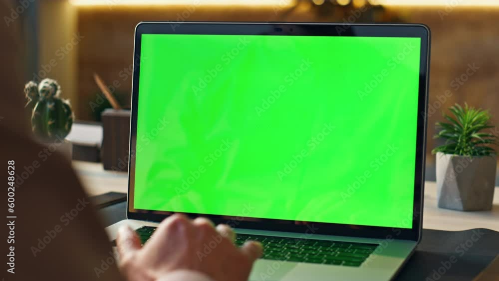 Worker scrolling touchpad green screen laptop at office workplace close up. Worker scrolling touchpad green screen laptop at office workplace close up.