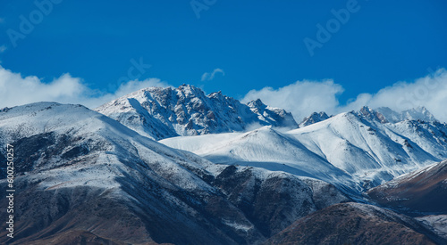 Snow-covered mountain peaks in Kyrgyzstan © chaossart