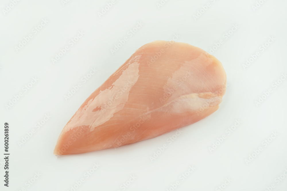 Raw fresh chicken fillet on a white background.Copy space.Raw Chicken breast Fillets.Food for retail.Procurement for designers.Ogranic food,healthy eating.Food concept.Top view.Close up. Raw fresh chicken fillet on a white background.Copy space.Raw Chicken breast Fillets.Food for retail.Procurement for designers.Ogranic food,healthy eating.Food concept.Top view.Close up.
