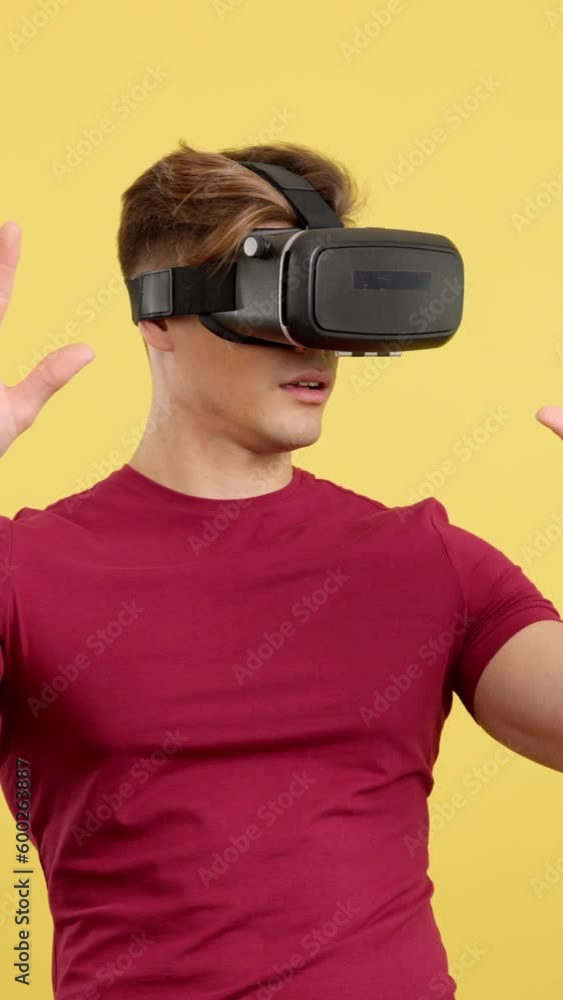 Surprised strong man with Virtual Reality goggles Surprised strong man with Virtual Reality goggles