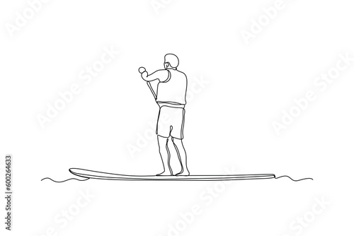 Single one line drawing happy boy paddle boarding. Summer beach concept. Continuous line draw design graphic vector illustration.