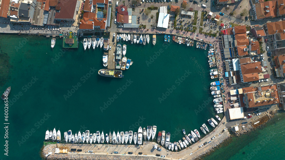 Boats waiting in the marina. In the resort, the boats are parked and waiting in the sea.