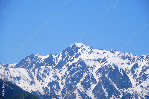 view of the mountain peaks on a sunny spring day in Hakuba, Japan