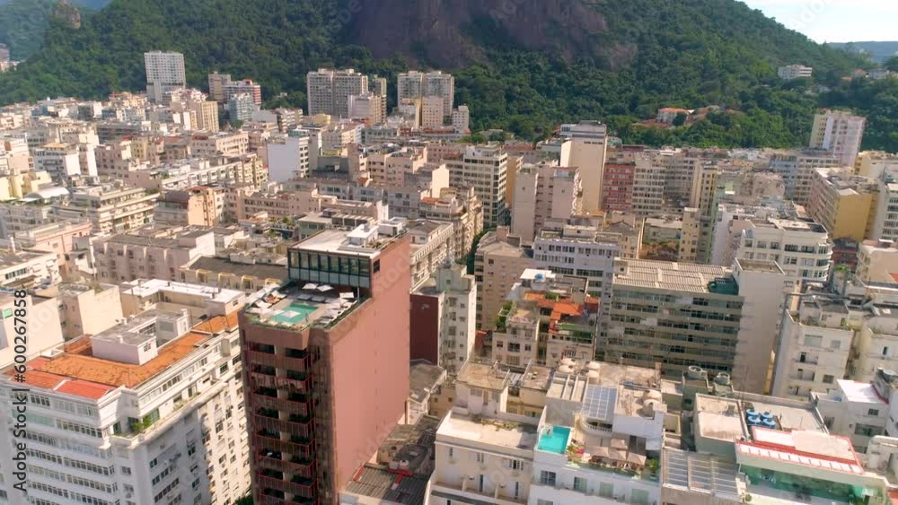 RIO DE JANEIRO, BRASIL - MAY, 2023: Drone aerial view of streets in city centre Gamboa district. Cityscape of a famous historical buildngs in downtown at sunny day with clouds from above. RIO DE JANEIRO, BRASIL - MAY, 2023: Drone aerial view of streets in city centre Gamboa district. Cityscape of a famous historical buildngs in downtown at sunny day with clouds from above.
