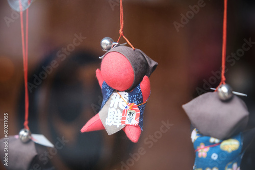 Sarubobo doll, Japanese amulet, in the town of Takayama in Gifu, Japan. photo