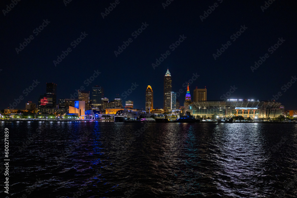 Cleveland Downtown from Lake Erie during night with illuminated skyline. 