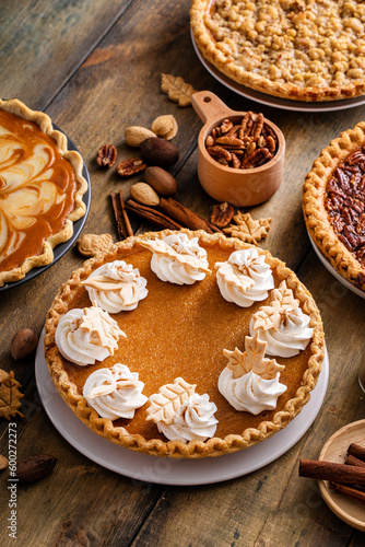 Traditional pumpkin pie for Thanksgiving with whipped cream