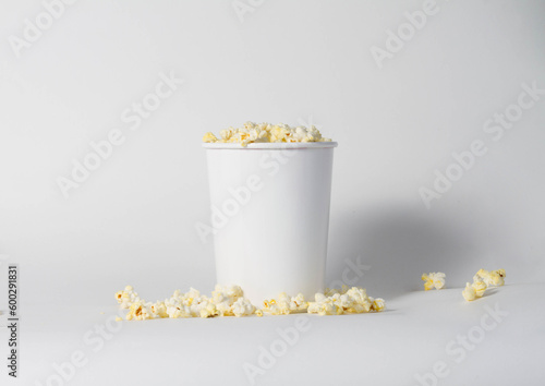 Blank white popcorn bucket mockup isolated, 3d rendering. Clear pop corn pail mockup fastfood front side view. Paper snack bucketful design mock up. 3D illustration.
