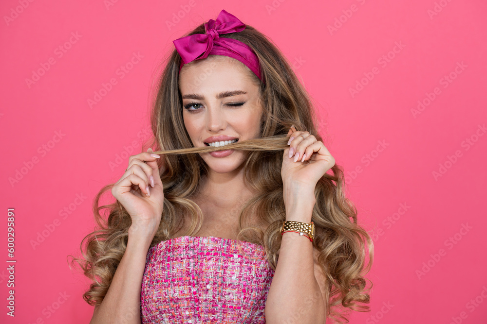 Fashion and beauty. Portrait of beautiful young woman isolated on pink background. Sensual beauty female model with hair bows face close up. Natural beauty woman. Retro pin up style. Fashion and beauty. Portrait of beautiful young woman isolated on pink background. Sensual beauty female model with hair bows face close up. Natural beauty woman. Retro pin up style.