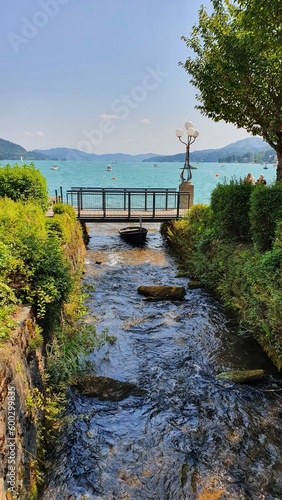 Wallpaper Mural wooden bridge over the river at "Wörthersee" in austria Torontodigital.ca