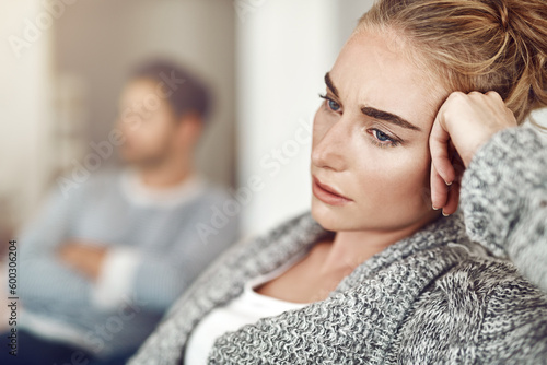 Schilderij op canvas Upset, depression and woman in argument with her boyfriend in the living room of their apartment