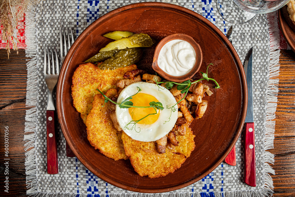 potato pancakes with fried egg and bacon potato pancakes with fried egg and bacon