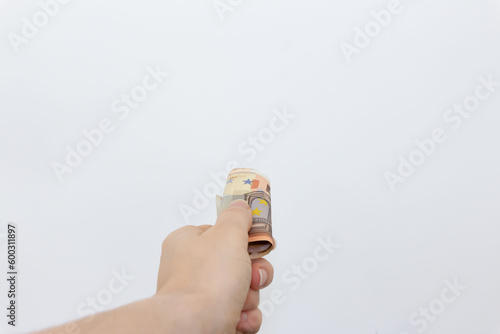 Holding a Roll of Euro Bills in First Person Perspective