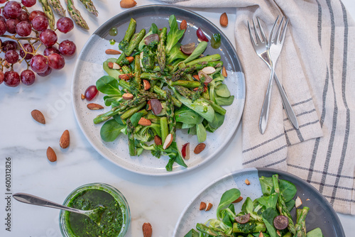 Spring salad with dandelion, asparagus, wild garlic photo