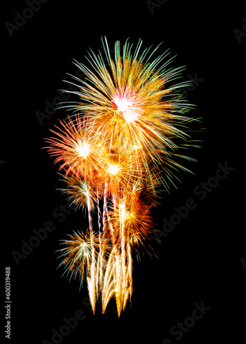 Festive new years colorful fireworks on black background for celebration and anniversary