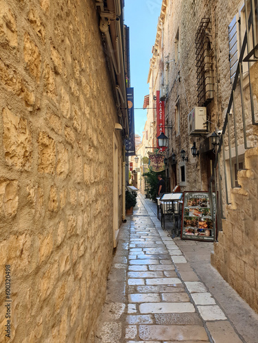narrow cobblestone street in Hvar, Croatia © Angela