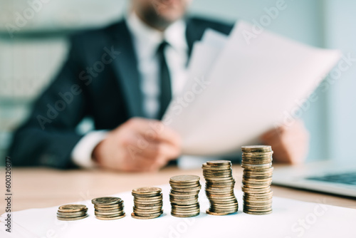 Fiduciary concept, business person with papers and financial funds in office