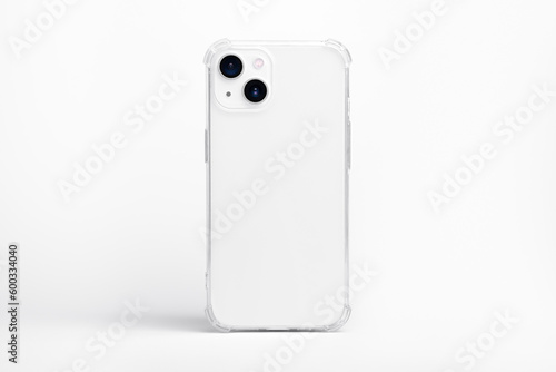 white iPhone 14 in clear transparent soft silicone case back view. Phone case mockup isolated on grey background photo