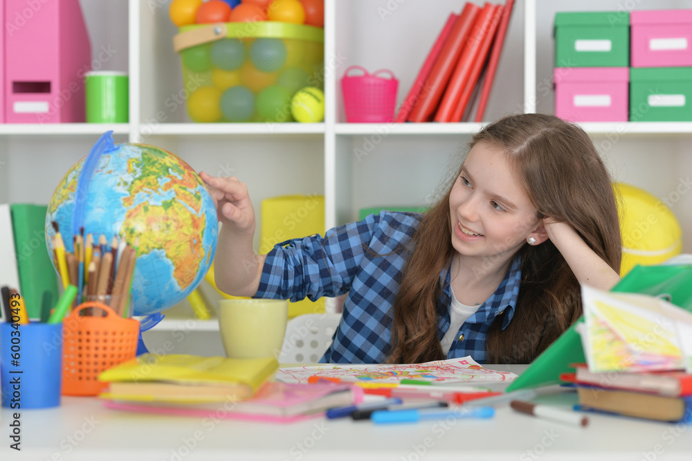 cute girl doing home work at desk cute girl doing home work at desk