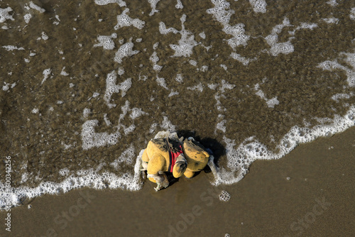 An abandoned bear doll on the beach of Cape Paradise in Houlong township, Miaoli county, Taiwan on September 18, 2021