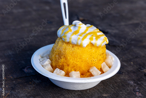 Fancy All-Natural Hawaiian Shave Ice with Mochi, Haupia Cream, and Lilikoi Butter Drizzle photo