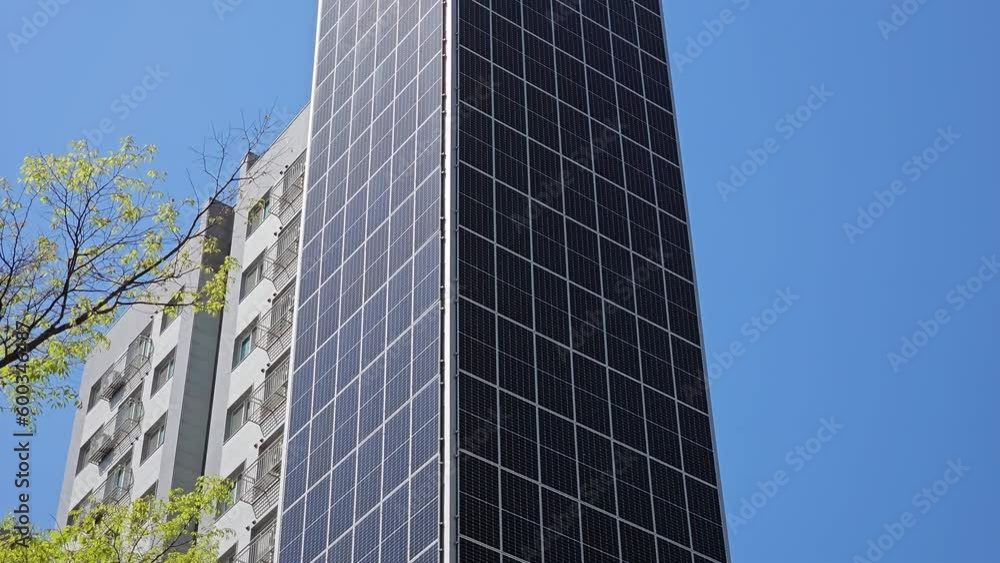 High-rise Sun-powered Building In Seoul, South Korea With Exterior Covered By Solar Panels. tilt-up High-rise Sun-powered Building In Seoul, South Korea With Exterior Covered By Solar Panels. tilt-up