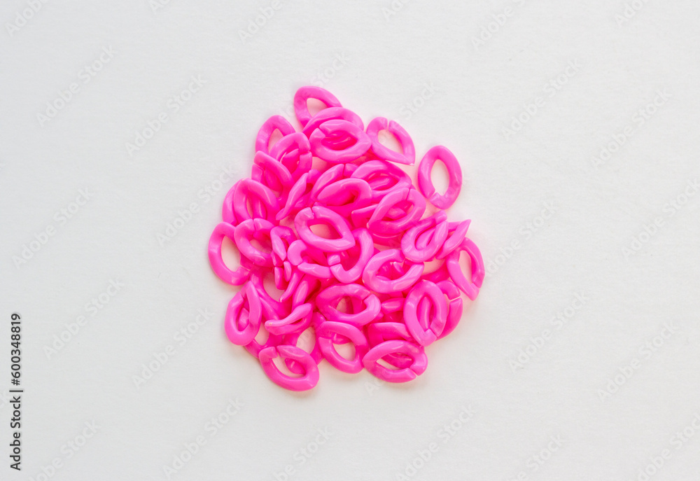 decorative plastic chain links, craft element, DIY. Blur effect. Weak focus. decorative plastic chain links, craft element, DIY. Blur effect. Weak focus.