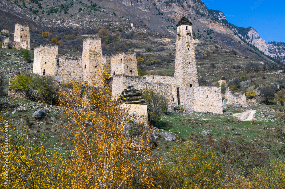 An ancient city in the mountains. Medieval towers built of stone to protect against attacks. Ruins of an ancient city. A fortress for protection. The city of Egikal in Ingushetia.