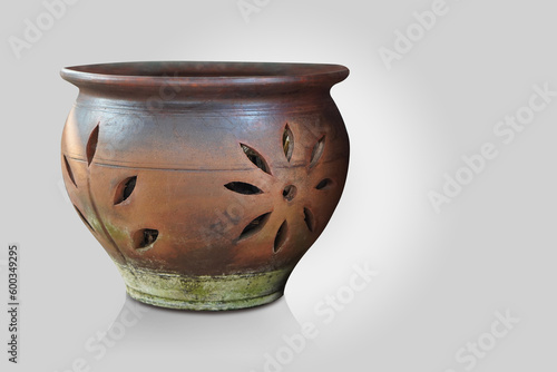 front view old brown and black clay pot on grey background, object, decor, modern, gift, ancient, vintage, copy space