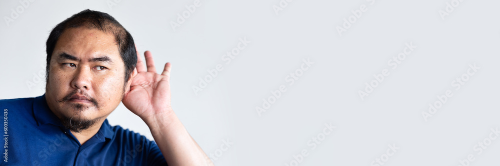 Fototapeta premium unhappy middle aged old man listening to bad news with negative expression