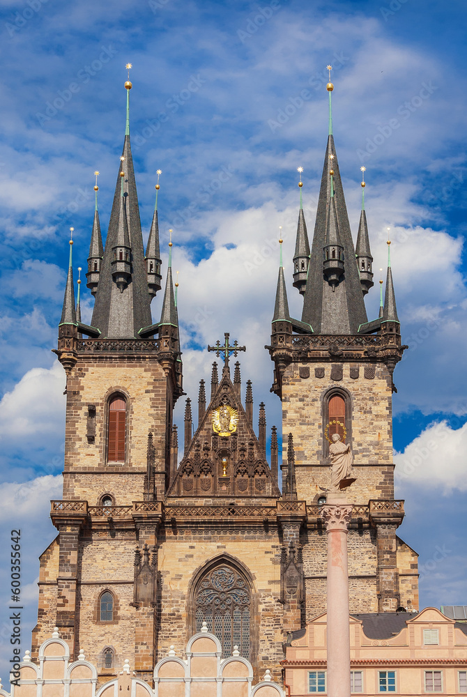 Church of Our Lady before Tyn famous gothic twin towers, completed in 1511 in Old Town Square, with Marian Column Church of Our Lady before Tyn famous gothic twin towers, completed in 1511 in Old Town Square, with Marian Column
