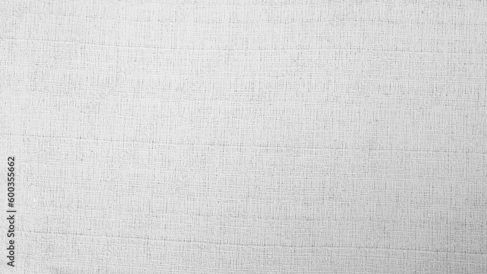 Fototapeta premium Organic Fabric cotton backdrop White linen canvas crumpled natural cotton fabric Natural handmade linen top view background organic Eco textiles White Fabric linen texture