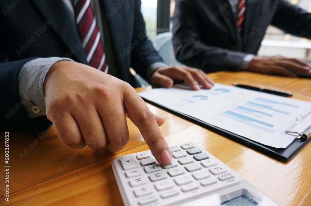 Financial inspector making report. calculating or checking balance. Business Audit concept. Financial inspector making report. calculating or checking balance. Business Audit concept.