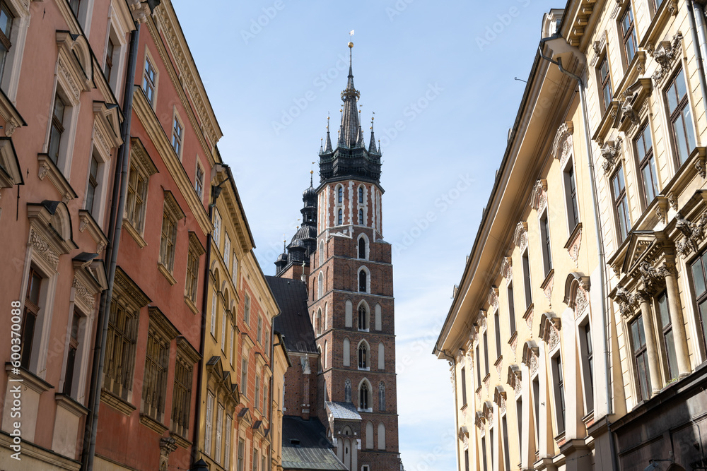 St. Mary's Basilica at the Main Market Square in the Old Town district of Krakow, Poland. Bazylika Mariacka or Kościół Mariacki Church, seen from the Floriańska street in Kraków.