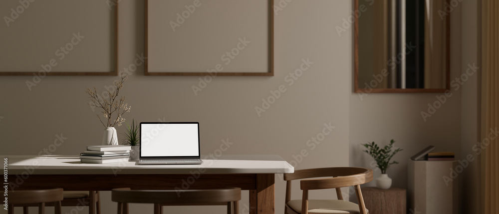 Laptop mockup and accessories on a dining table in minimal Scandinavian dining room. Laptop mockup and accessories on a dining table in minimal Scandinavian dining room.