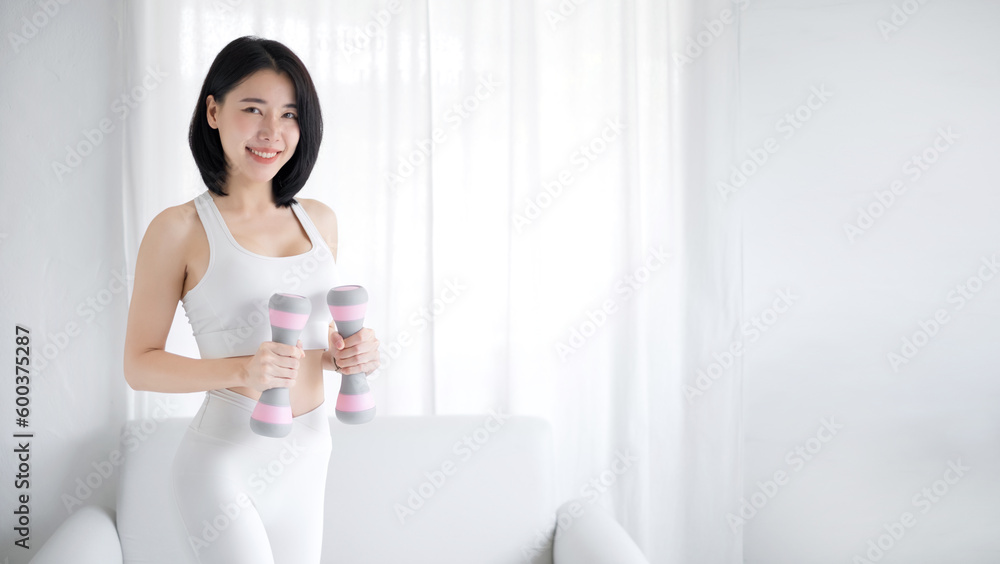 fitness, sport and healthy lifestyle concept , smiling young woman exercising at home fitness, sport and healthy lifestyle concept , smiling young woman exercising at home