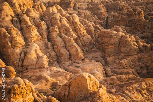 Rock formations near Wadi Musa in Jordan - bathed in golden light.