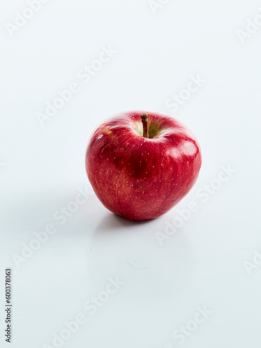 one red apple on white background