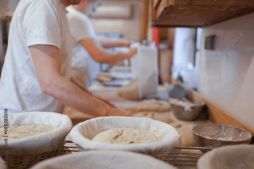 Fototapeta premium Organic Bakery - details of baker baking bread