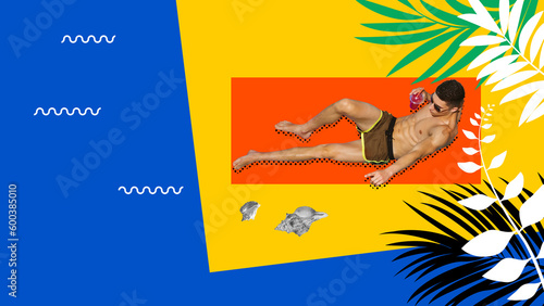 Careless time. One attractive guy, muscular man wearing swimsuit and sunglasses lying on beach and drinking cocktail on seaside background. Concept of traveling, vacation, summer, weekends, rest, ad photo