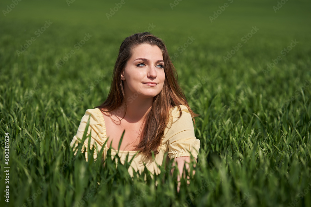 Plus size woman in a wheat field Plus size woman in a wheat field