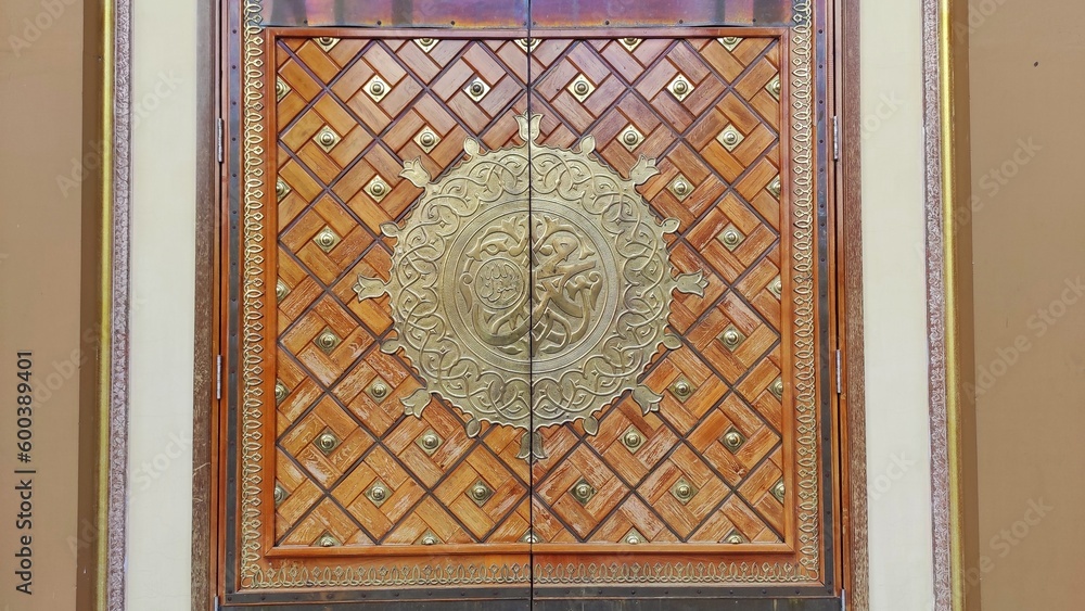 The door asian architecture of mosque with islamic ornament and decoration on it
