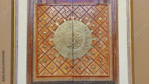 The door asian architecture of mosque with islamic ornament and decoration on it