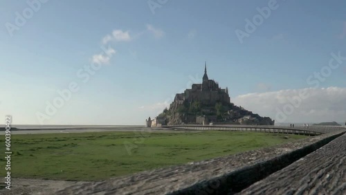 Wide angle view of Mont-Saint-Michel in Normandy, France. Slow motion footage of the tidal island on which an 11th century Abbey stands. Copy space available